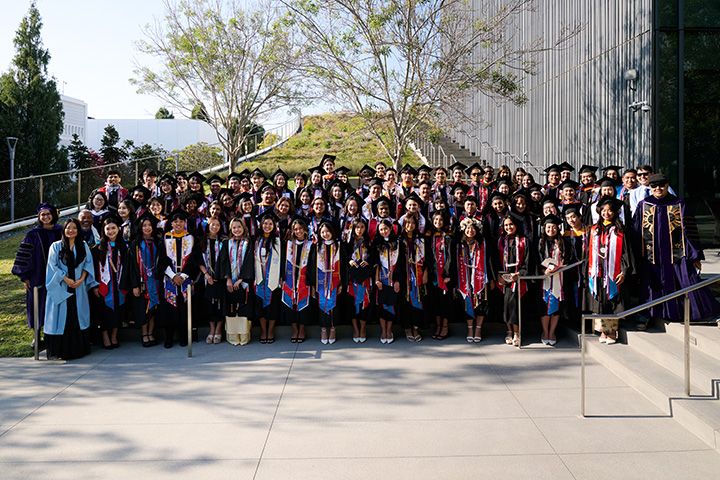 Graduates honored during the Asian Pacific Islander Desi American Grad Ceremony in a large group photo
